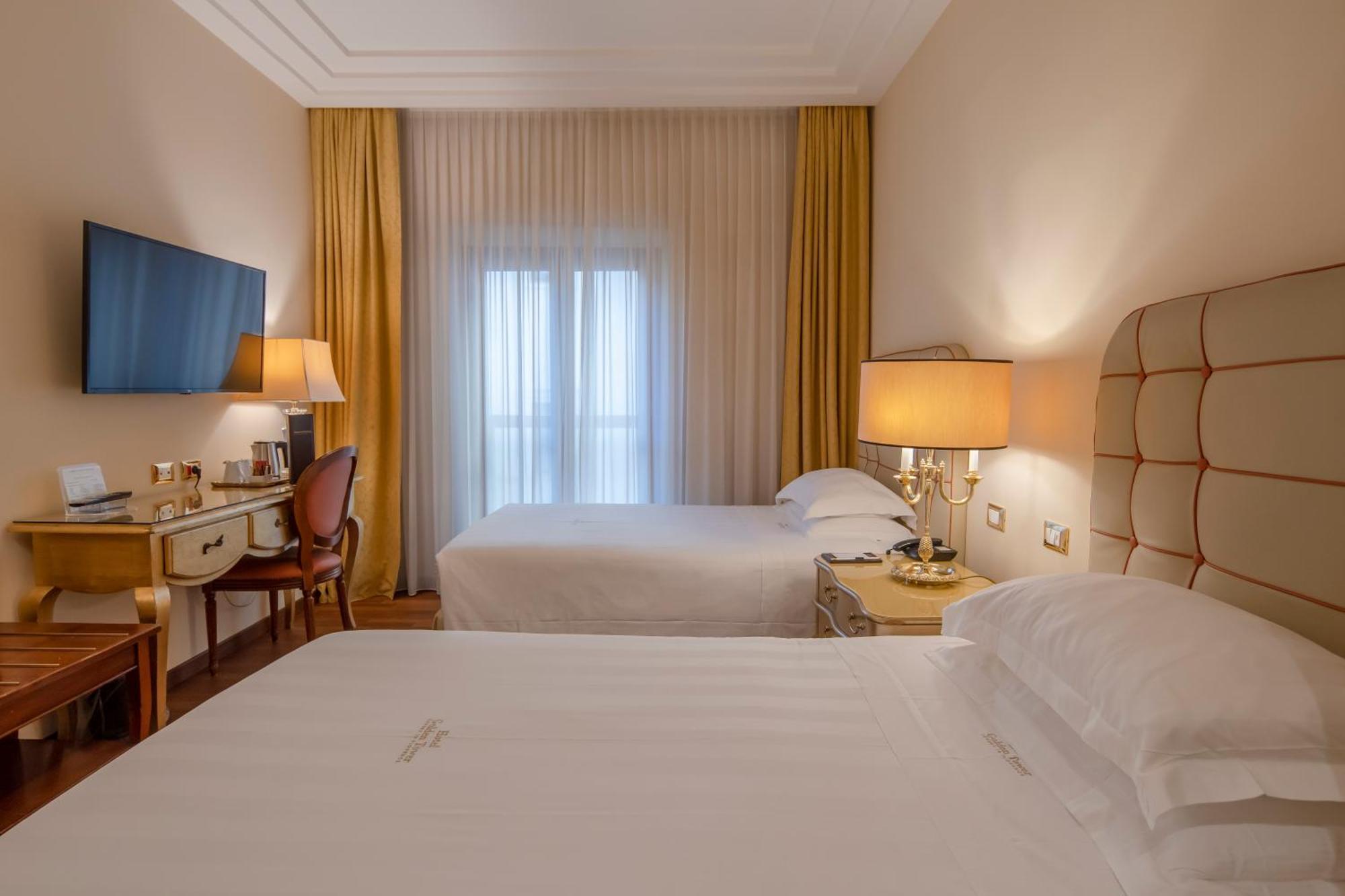 Golden Tower Hotel & Spa Флоренция Экстерьер фото A room at the hotel